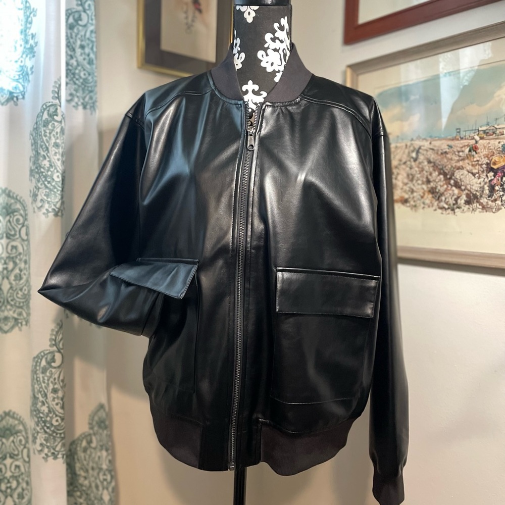 NWT Black bomber style jacket. Poly shell & lining.